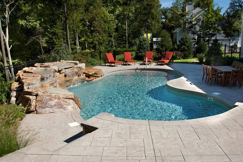 Swimming pool and stamped concrete project example 21